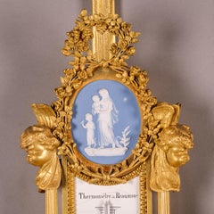 A Louis XVI Style Cartel Clock and Barometer After Pierre Gouthière