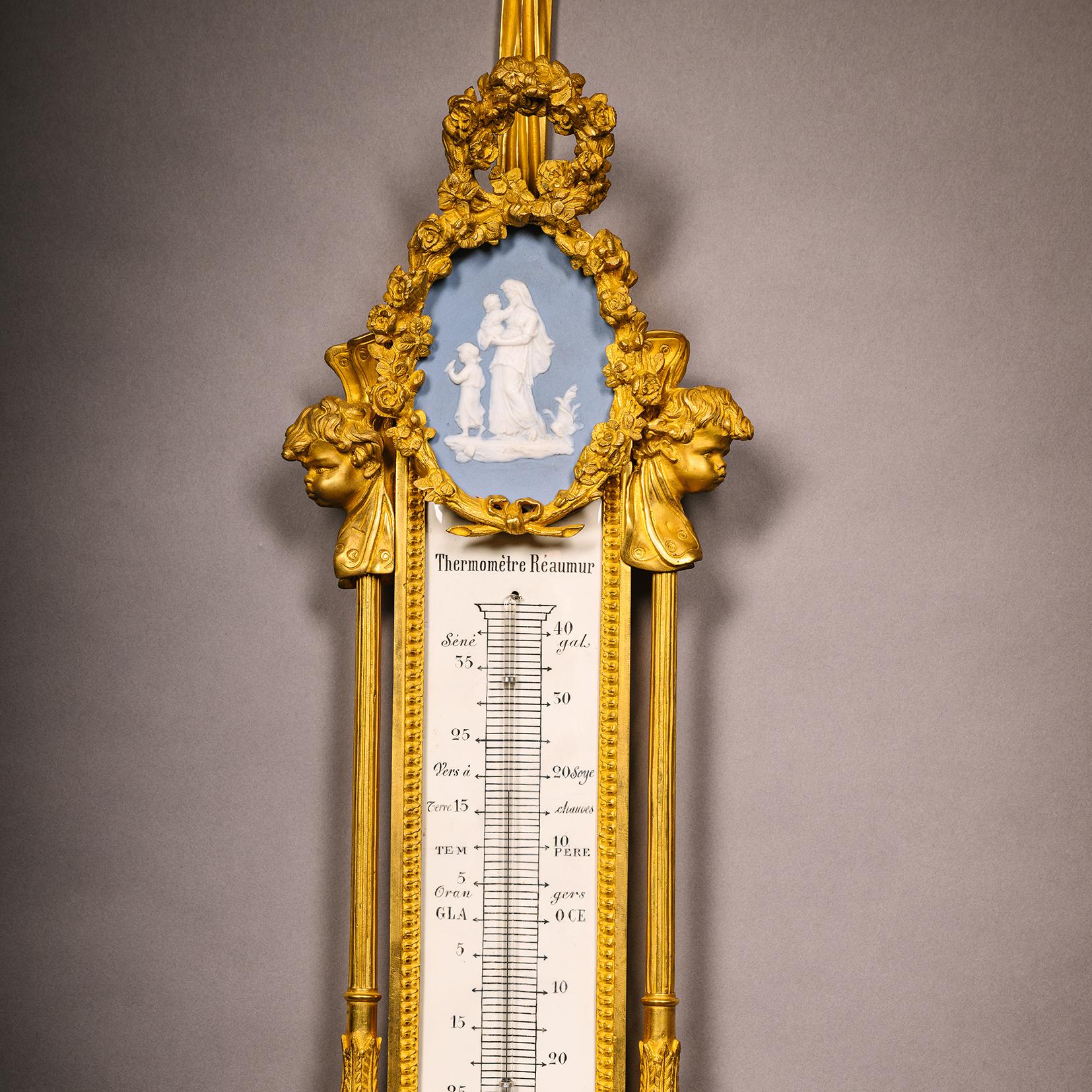 Luigi XVI A Louis XVI Style Cartel Clock and Companion Barometer in vendita