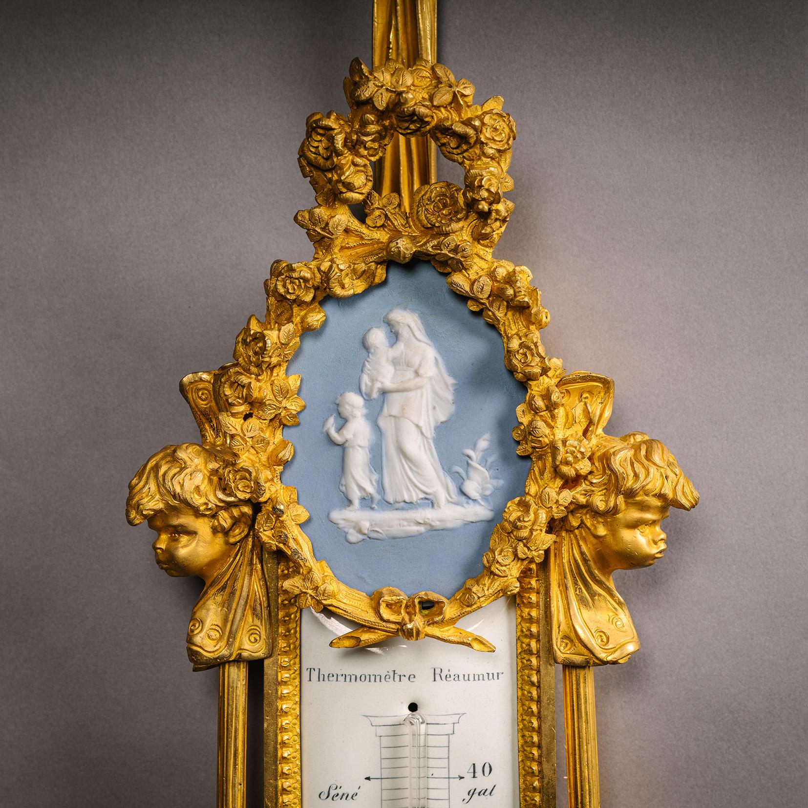 A Louis XVI Style Cartel Clock and Companion Barometer In condizioni buone in vendita a Brighton, West Sussex