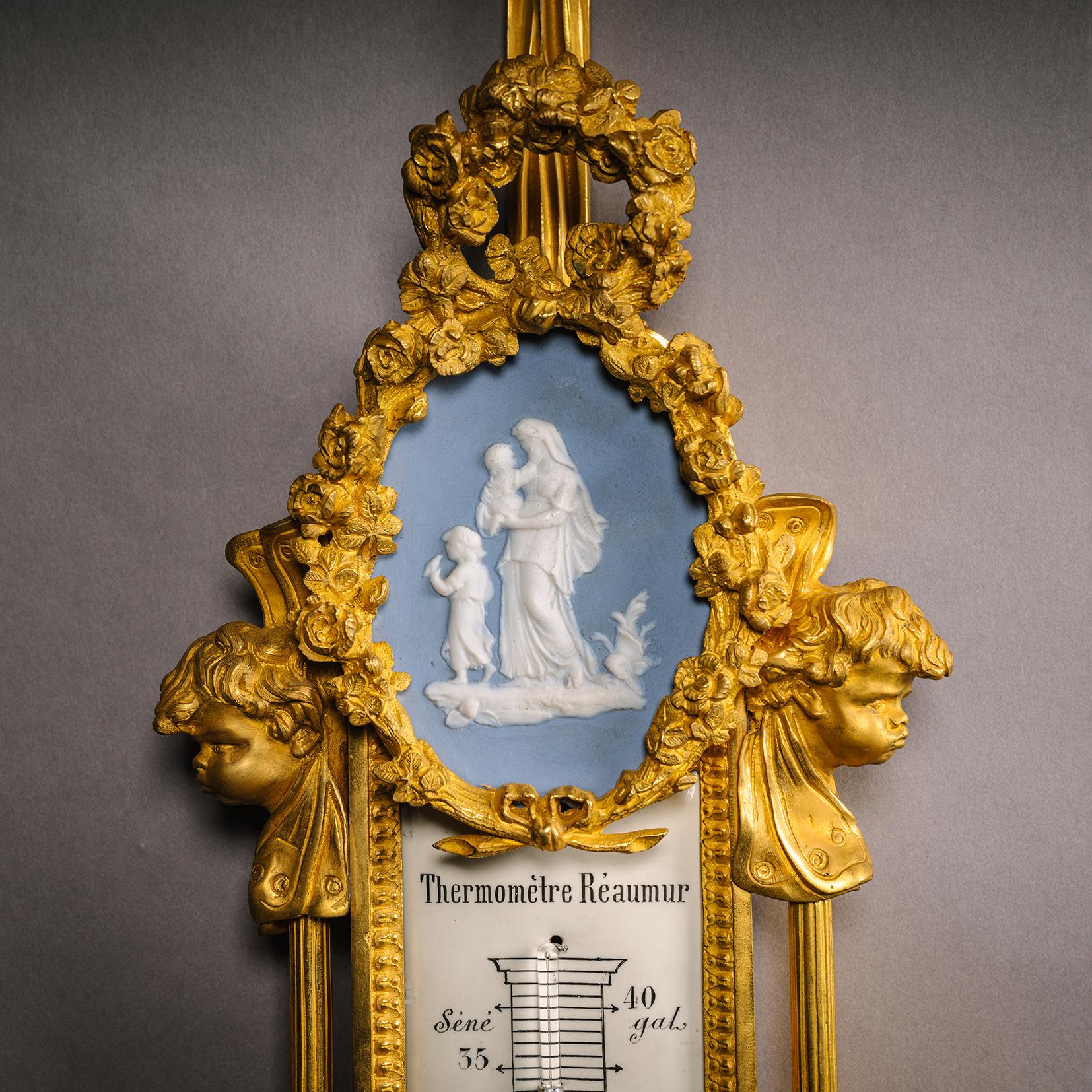 XIX secolo A Louis XVI Style Cartel Clock and Companion Barometer in vendita