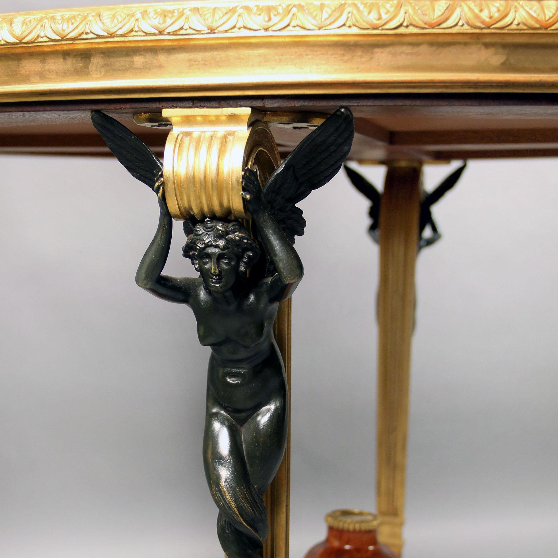A Fine Louis XVI Style Patinated and Gilt-Bronze Mounted Centre Table After The Fontainebleau Model with a Verde Patricia Marble Top, by Zwiener Jansen Successeur.

The bronze mounts stamped to the reverse ‘’ZJ’ for Zwiener / Jansen