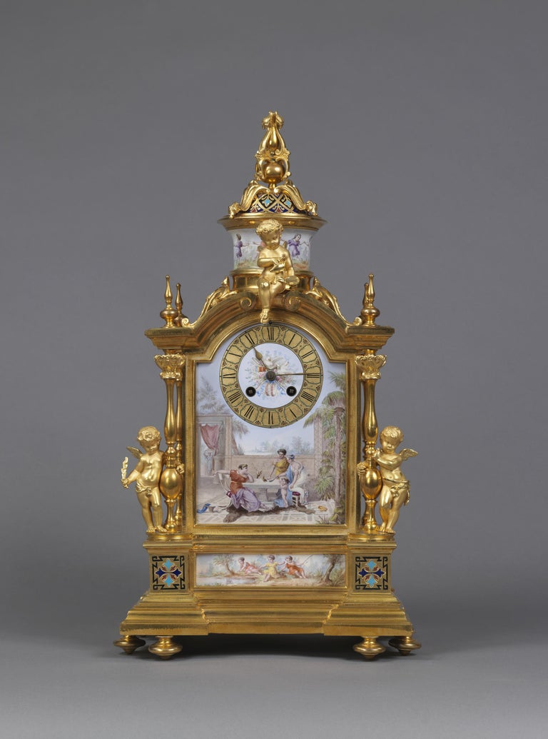 An exceptional Louis XVI style champlevé enamel and gilt-bronze mantel clock with finely painted neoclassical scenes by Leroy & Fils.

French, circa 1880. 

Stamped to the movement ‘LEROY & FILS A PARIS, 823’.

This fine gilt-bronze and