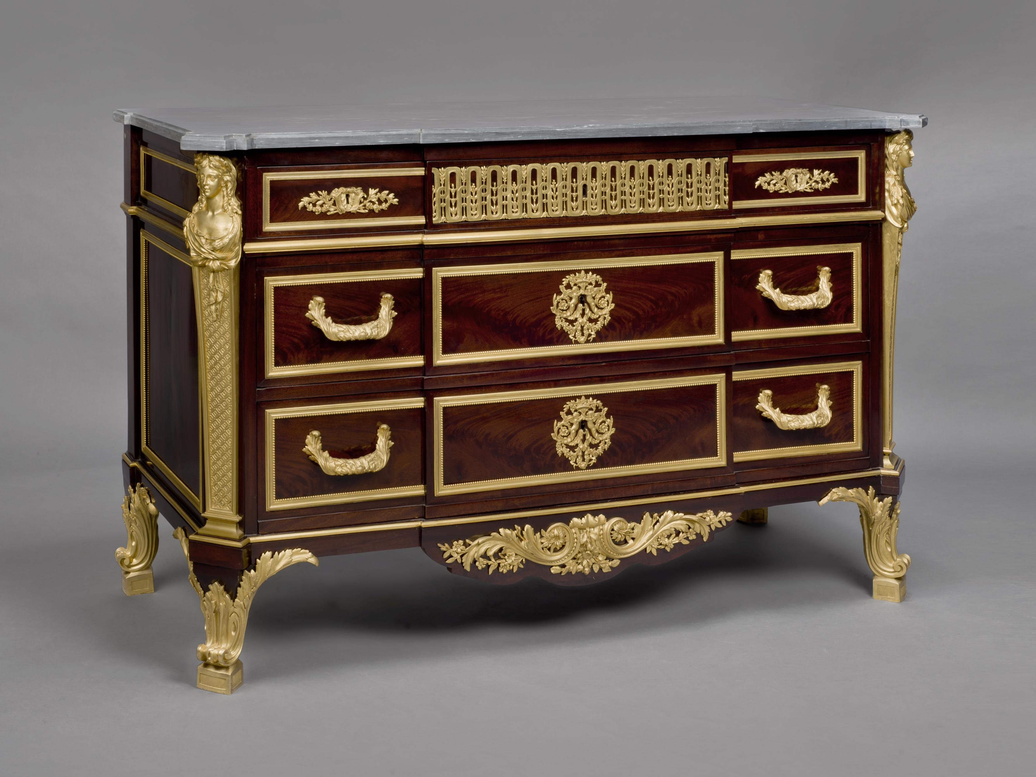 A fine Louis XVI style gilt bronze-mounted mahogany commode, with a blue turquin marble top after the model by Jean-Henri Riesener.

French, circa 1880.

The gilt bronze mounts stamped 'T'. The carcass bearing a faux stamp for 'RIESENER JME