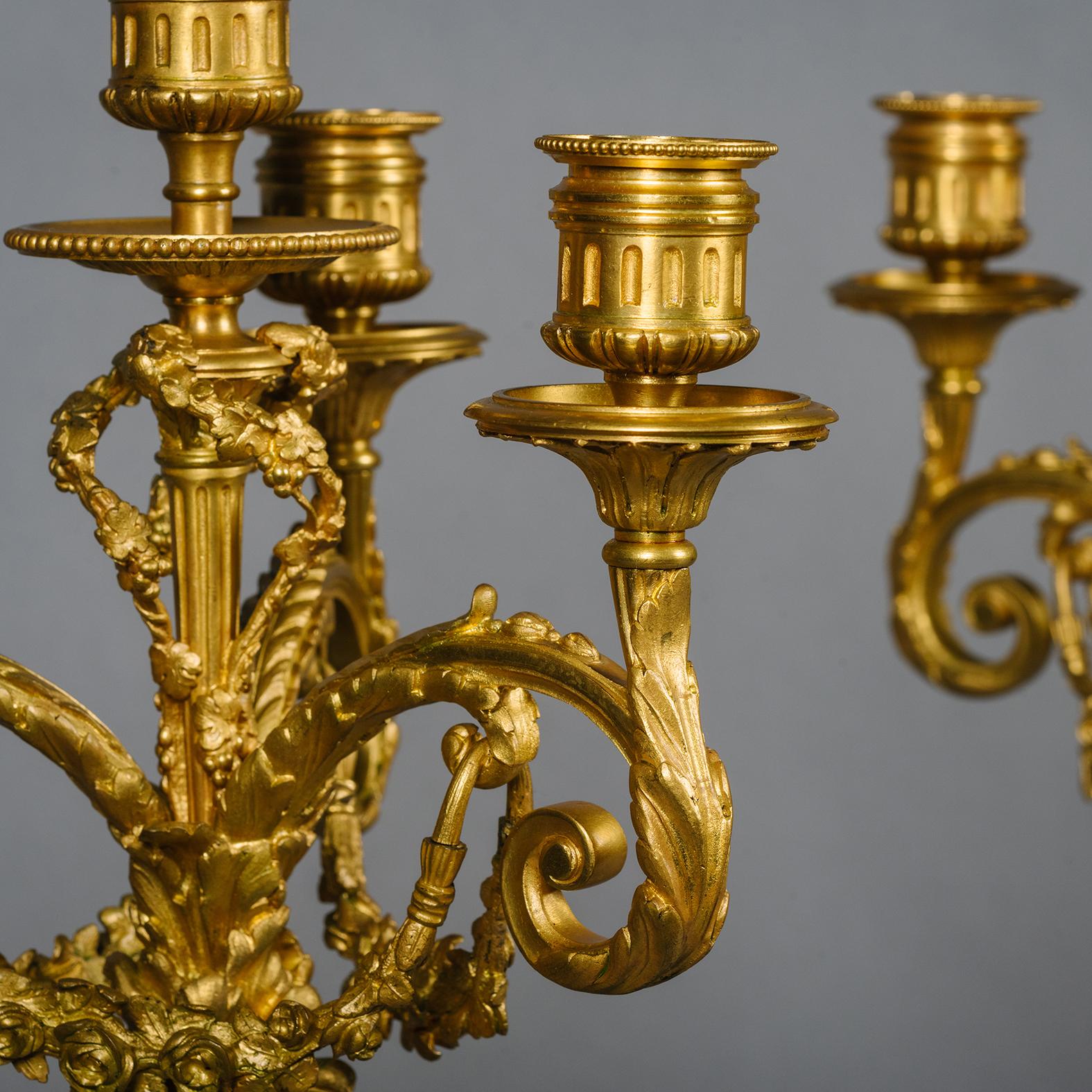 A Louis XVI Style Gilt and Patinated Bronze and Marble Clock Garniture For Sale 6