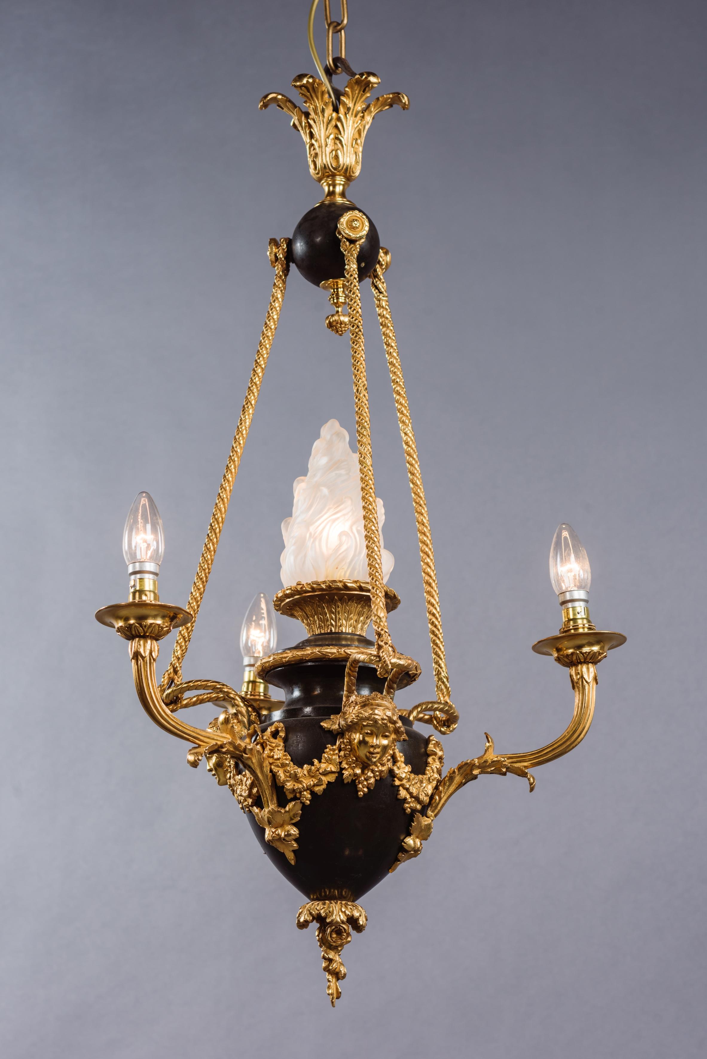 French Louis XVI Style Gilt and Patinated Bronze Four-Light Chandelier, circa 1900