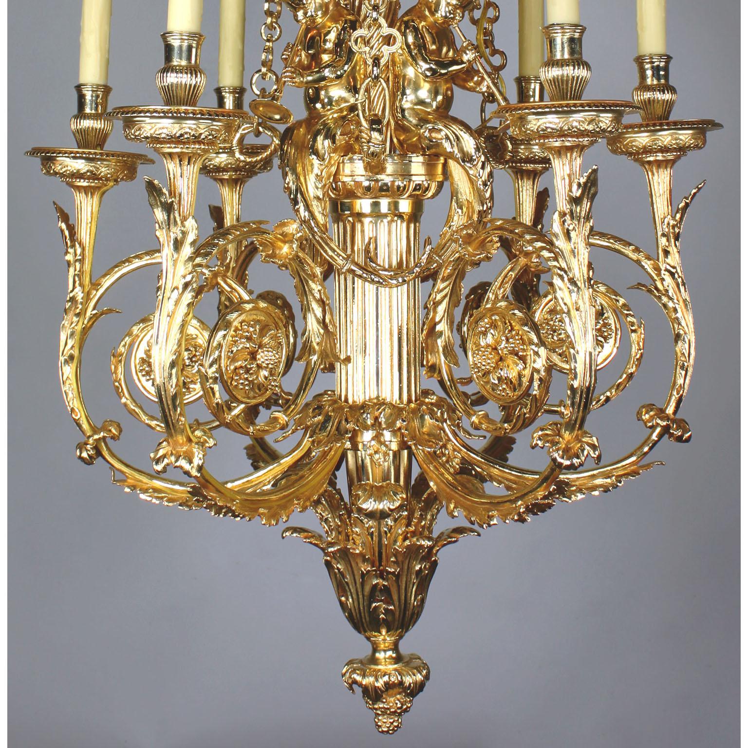 A French Louis XVI style gilt-bronze figural seven-light chandelier with Figures of Putti (Children), after the model by Pierre Gouthière in the Cabinet doré for Marie-Antoinette at the Royal Palace of Versailles. The nicely cast bright gilt-bronze