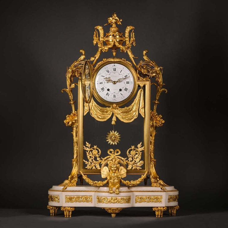 A very rare Louis XVI style gilt-bronze and glass, Pendule a cage, by Francois Linke, with a white marble base.

Linke Index no. 076'.
Linke Title: 'pendule a cage'.
Signed to the dial 'F. Linke a Paris'.
Stamped to the bronze case 'F. Linke'.
