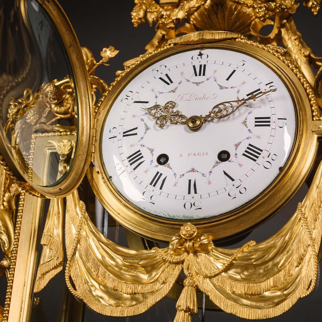 French Louis XVI Style Gilt-Bronze and Glass Mantel Clock by Francois Linke For Sale