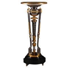 A Louis XVI Style Gilt-Bronze and Polished Steel Pedestal Table