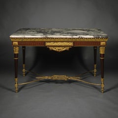 A Louis XVI Style Gilt-Bronze Mounted Centre Table