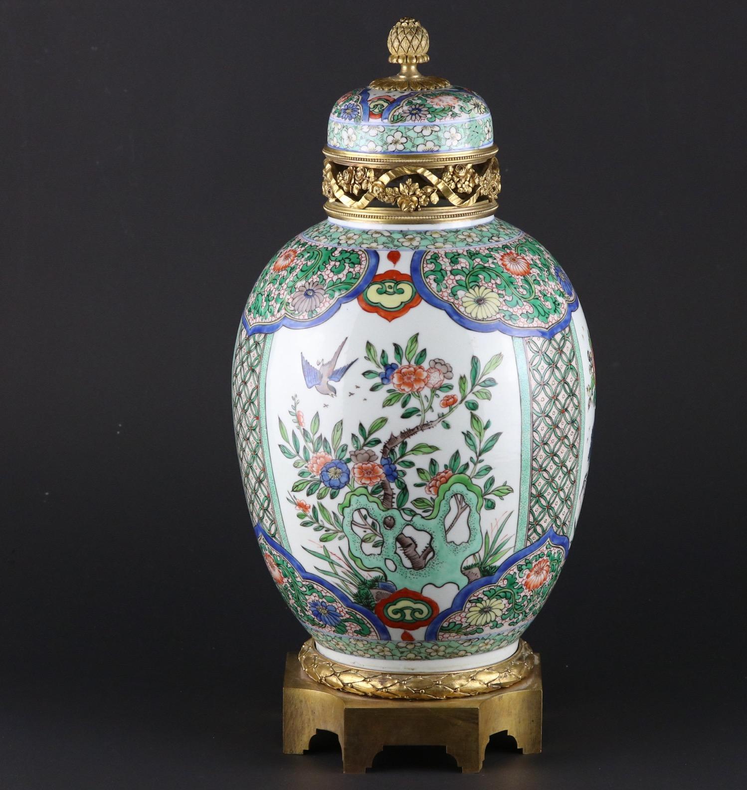 A Louis XVI style gilt bronze mounted French Samson porcelain vase modeled and decorated in the Chinese Kangxi and famille verte style, Paris, last quarter of the 19th century. Signed by Samson on the bottom. Lid restored and bottom drilled for