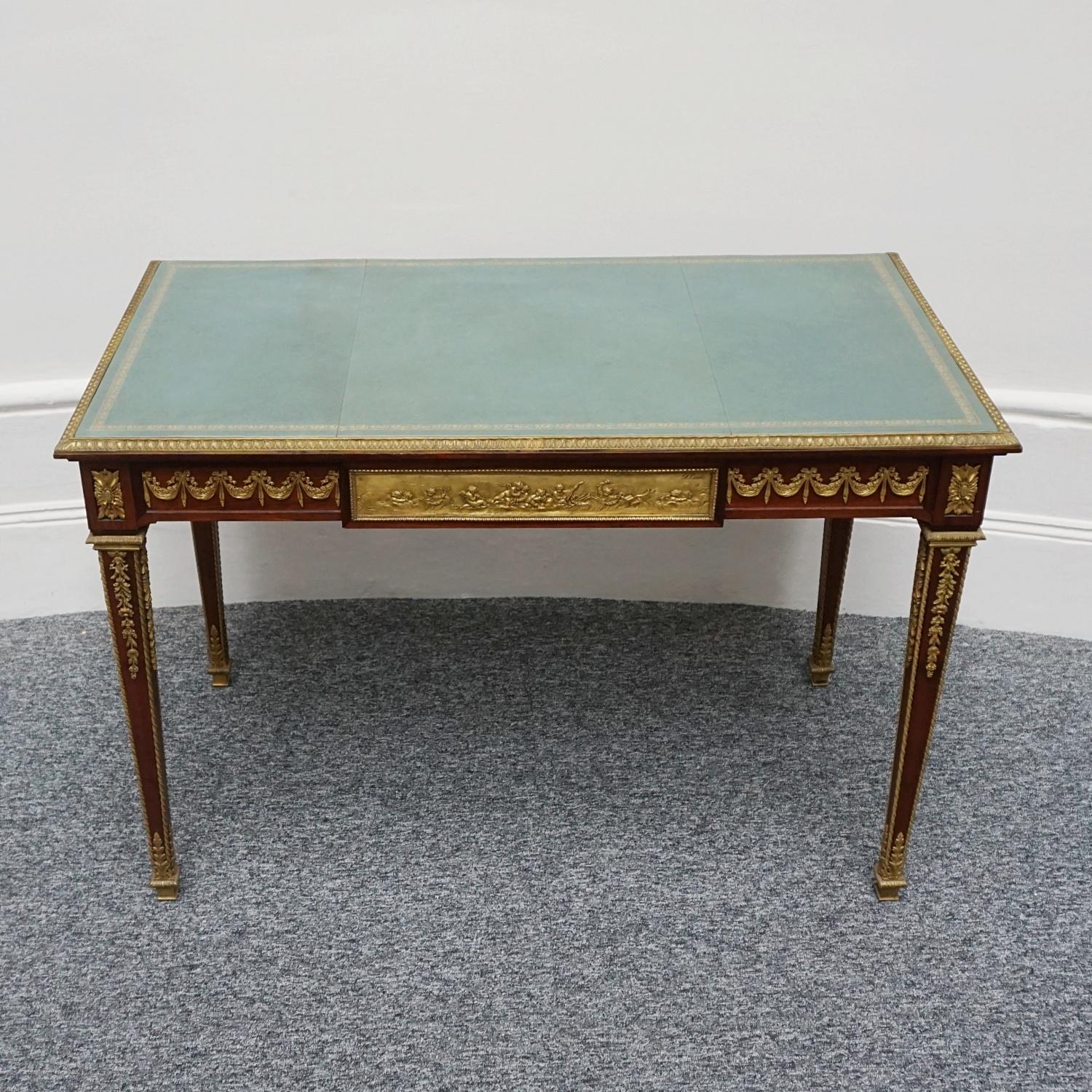 A Louis XVI style gilt-bronze mounted Kingwood veneered writing table with original inset green leather top. Signed F.Linke to front gilt bronze panelled drawer. Excellent original condition. 

Dimensions: H 72.5cm W 110cm D 61cm

Origin: