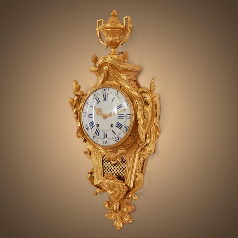 Gilt Louis XVI style gilt bronze Quarter Striking Cartel Clock