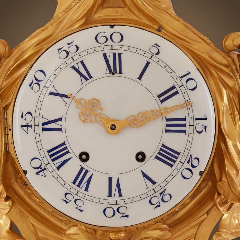 19th Century Louis XVI style gilt bronze Quarter Striking Cartel Clock