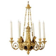 A Louis XVI Style Gilt-Bronze Six-Light Chandelier 'Aux Termes'.
