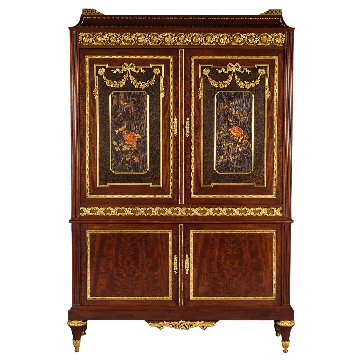 A Louis XVI Style Lacquer Mounted Mahogany Cabinet by Paul Sormani