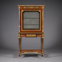 A Louis XVI Style Mahogany and Amboyna Vitrine Cabinet