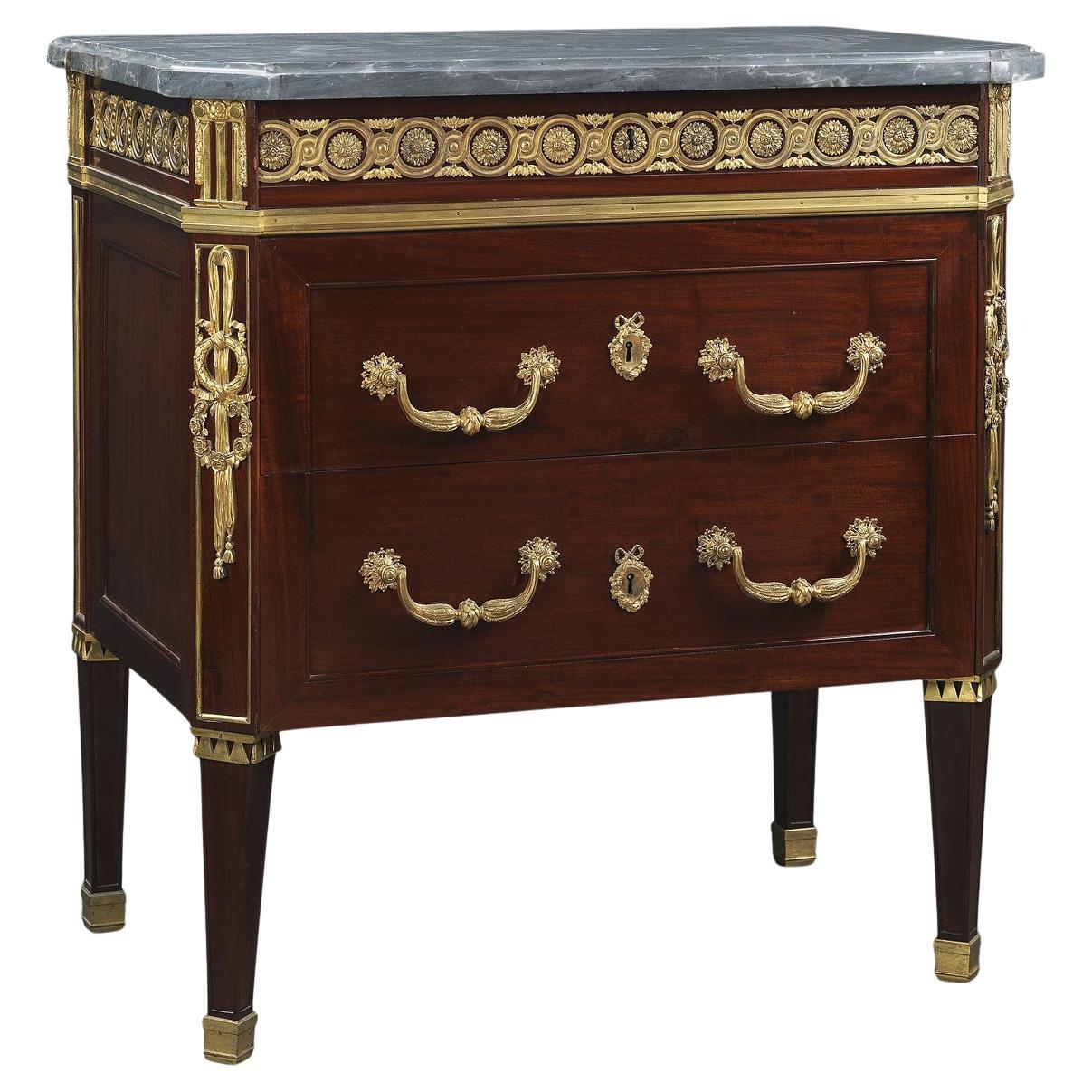 A Louis XVI Style Mahogany Commode