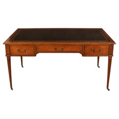 A Louis XVI Style Mahogany Desk with Leather Top