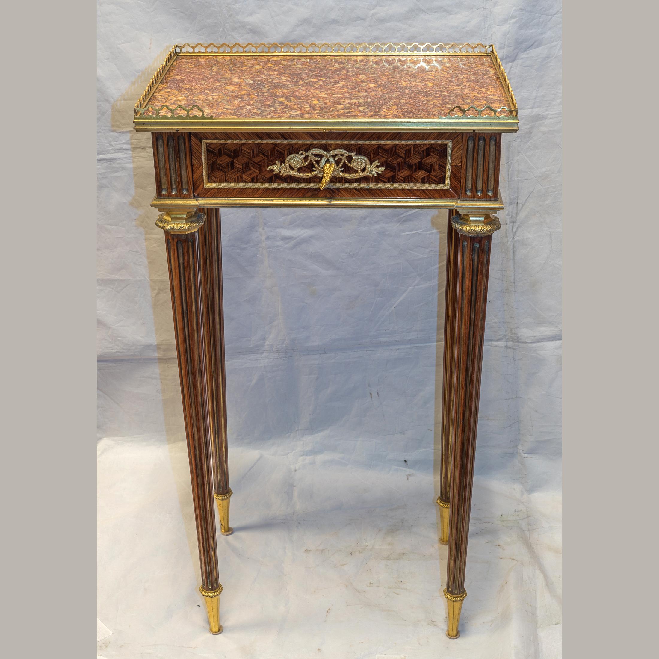 A fine quality Louis XVI-style mahogany side table. Stamped E. ZWIENER

Maker: Joseph-Emmanuel Zwiener (1848-1895)
Date: 19th century
Origin: French
Size: H 30 x W 16 1/2 x D 12 inches.