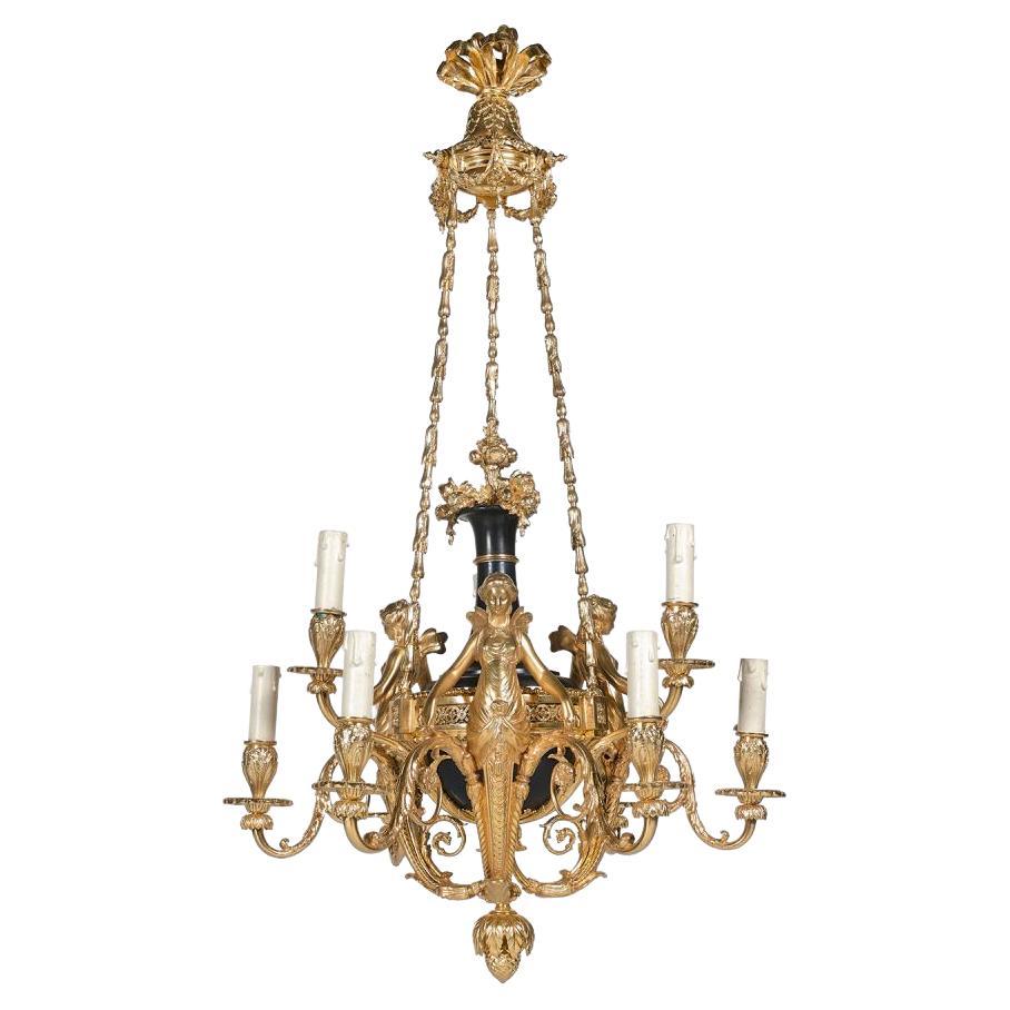 A Louis XVI Style Ormolu and Patinated 6-Light Chandelier "aux Termes"