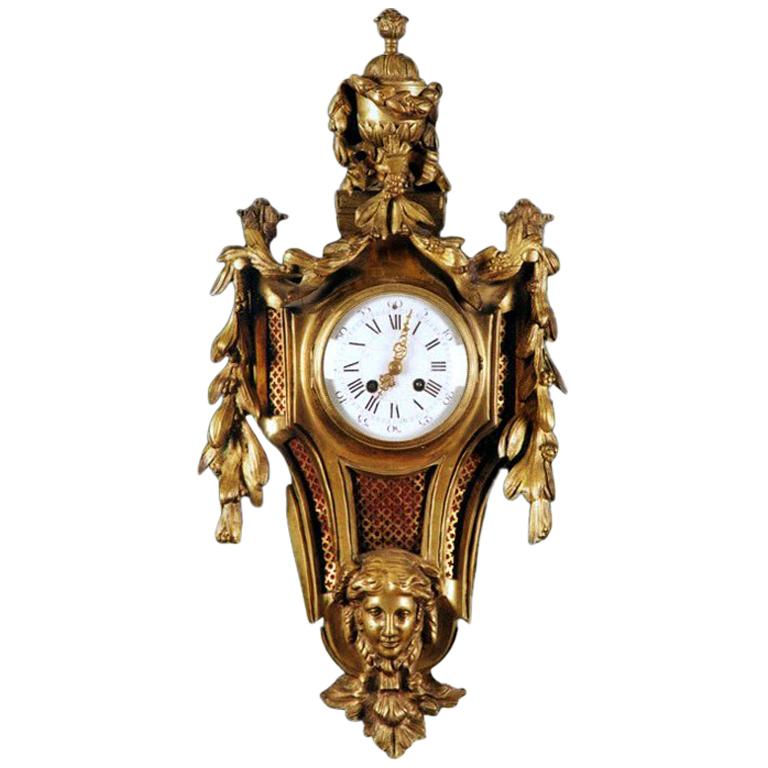 A Louis XVI Style Ormolu Cartel Clock For Sale