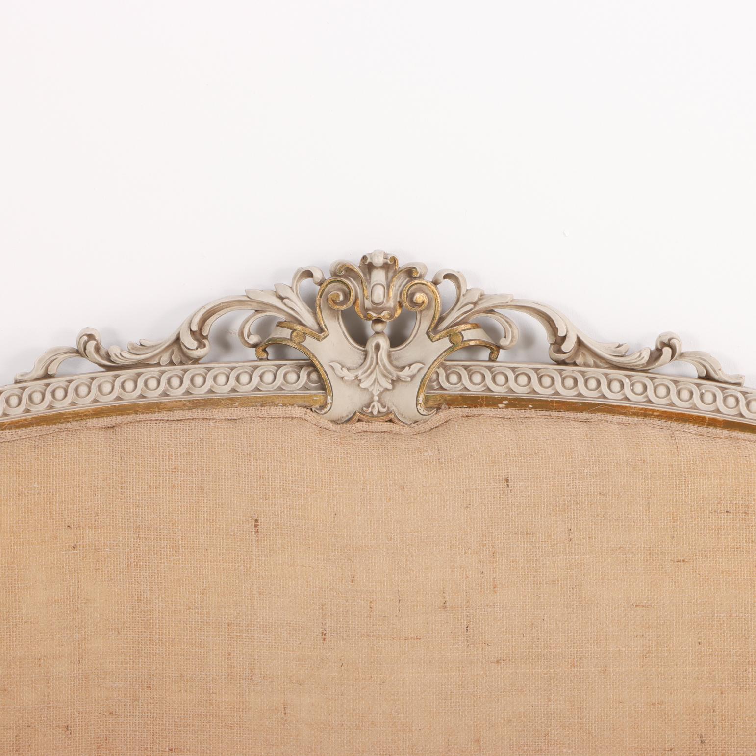 American A Louis XVI style painted and gilt carved wood bed, C. 1930. For Sale