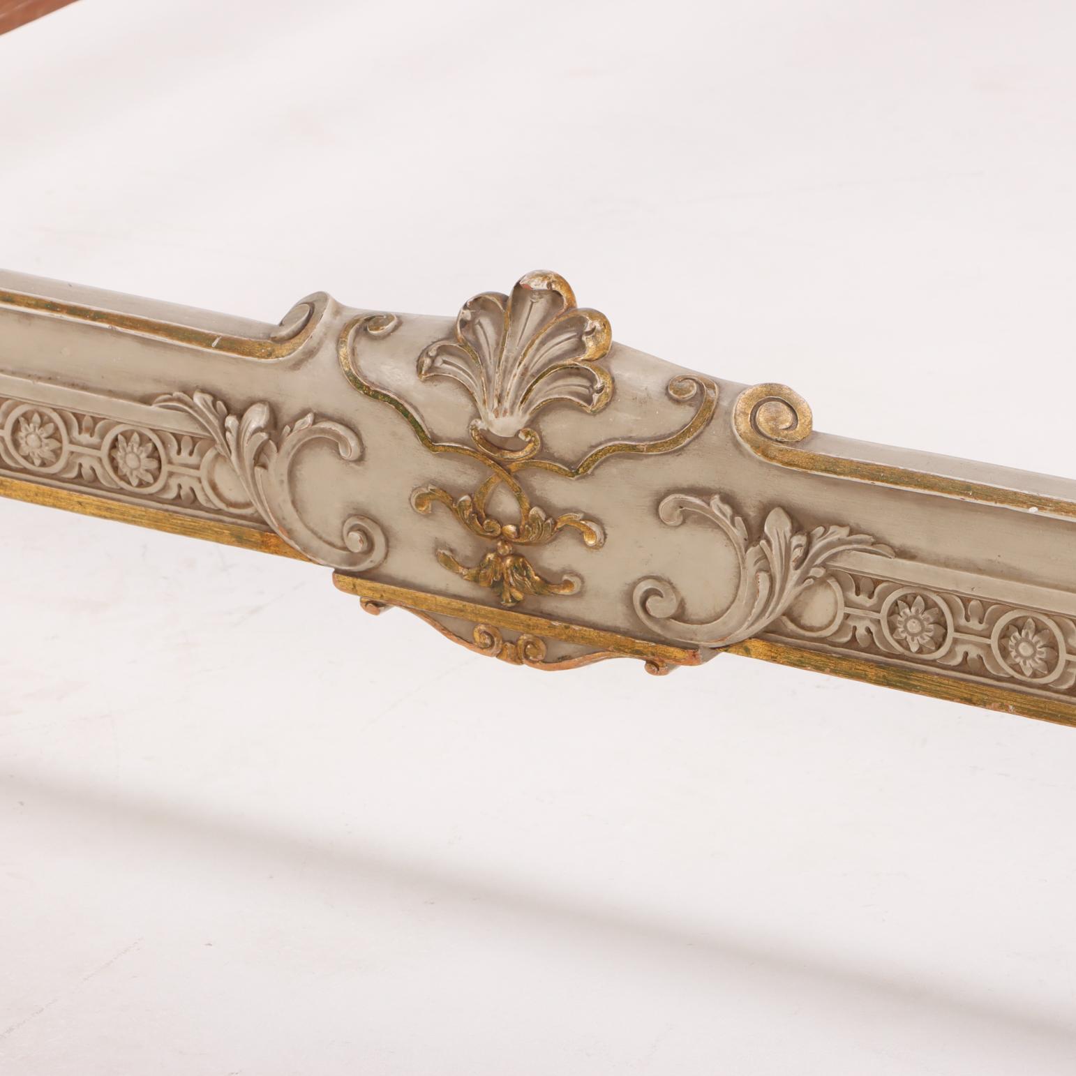 Carved A Louis XVI style painted and gilt carved wood bed, C. 1930. For Sale