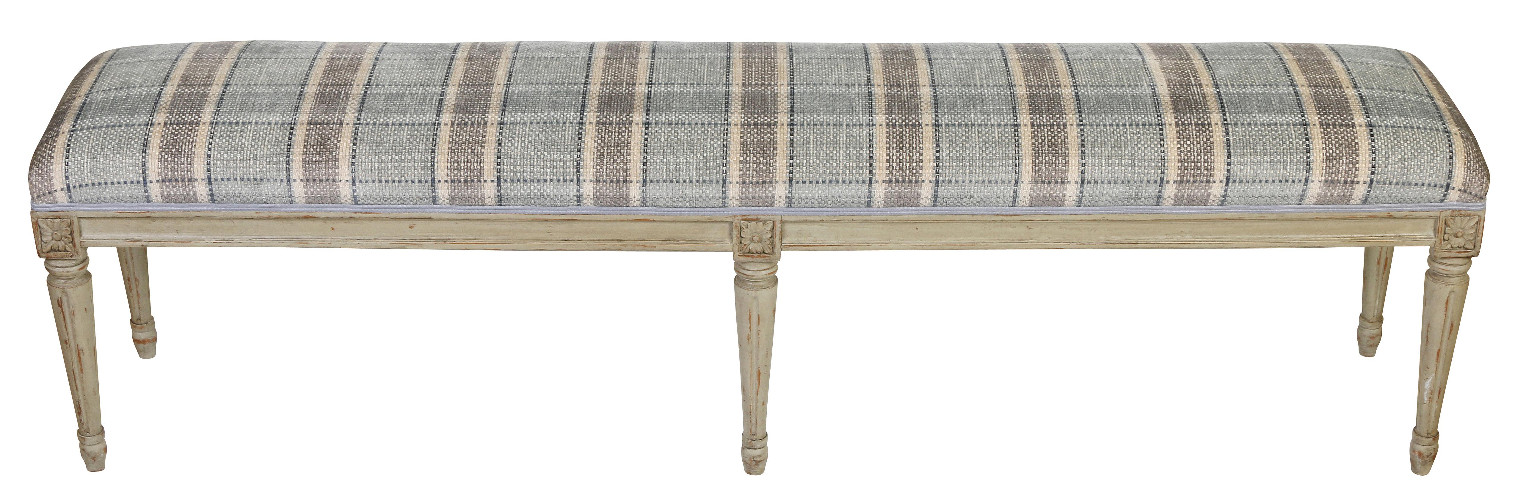 Perfect for the foot of a bed, this long bench has s grey painted finish. The legs are tapered and fluted, with the lovely carved die joins (block where. the legs meet the base of bench ) that are characteristic of the Louis XVI style. The bench is