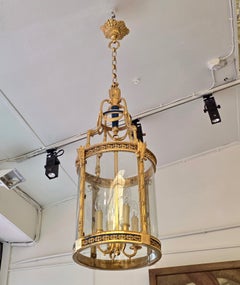 A Louis XVI Style Patinated and Gilt Bronze Four Light Hall Lantern, circa 1880