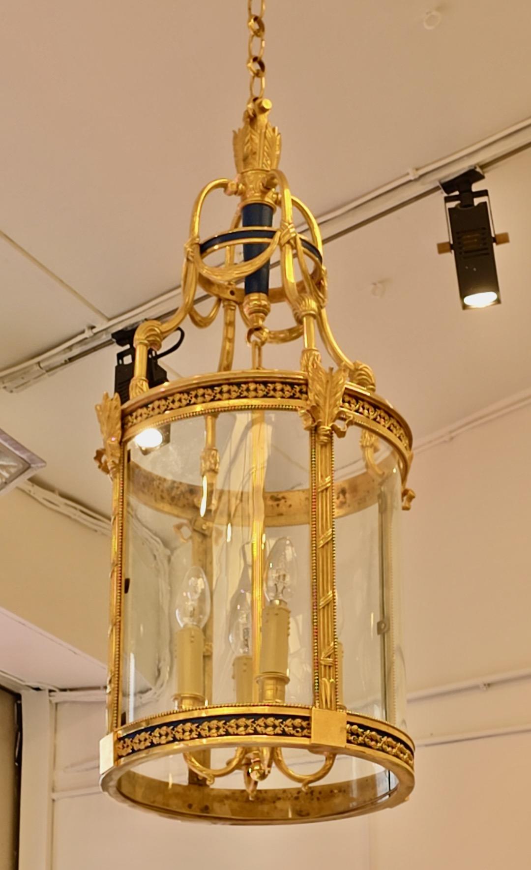 French A Louis XVI Style Patinated and Gilt Bronze Four Light Hall Lantern, circa 1880 For Sale