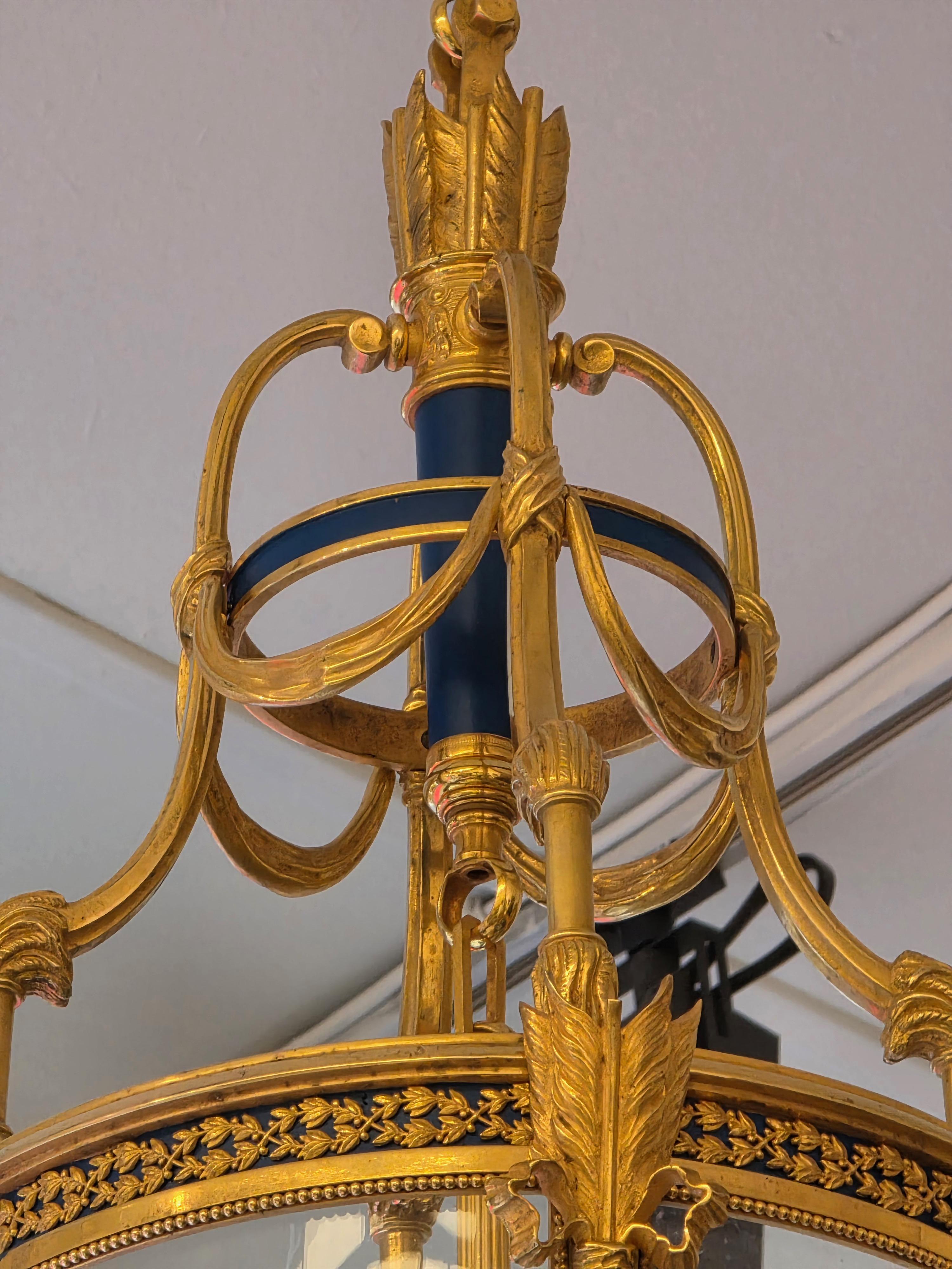 Late 19th Century A Louis XVI Style Patinated and Gilt Bronze Four Light Hall Lantern, circa 1880 For Sale