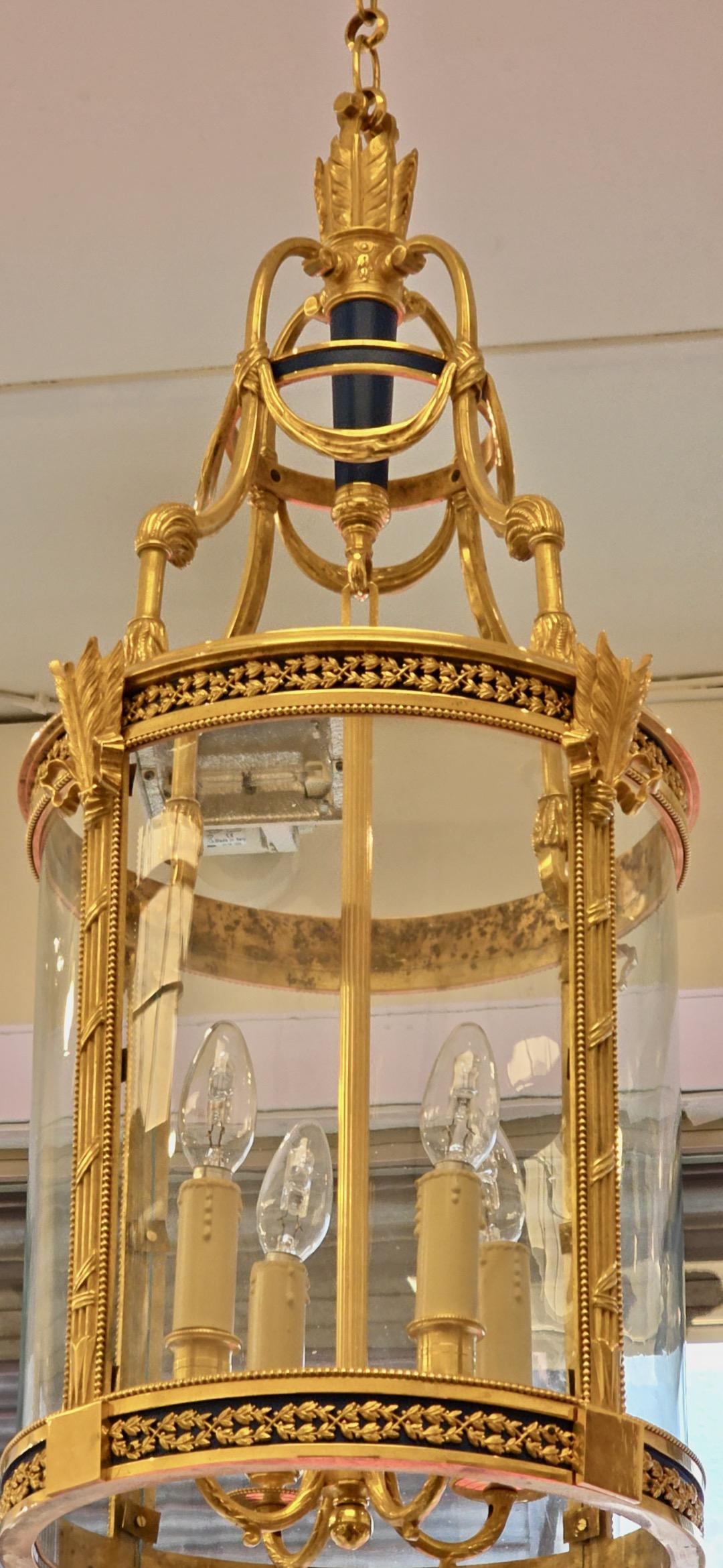 A Louis XVI Style Patinated and Gilt Bronze Four Light Hall Lantern, circa 1880 For Sale 1