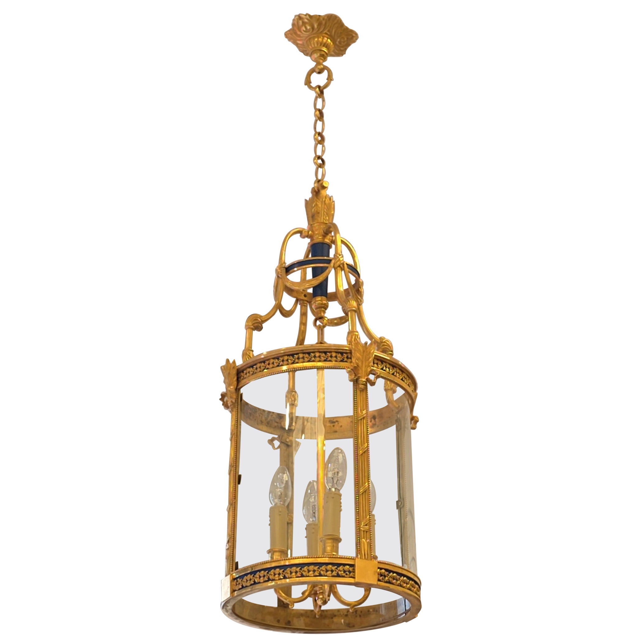 A Louis XVI Style Patinated and Gilt Bronze Four Light Hall Lantern, circa 1880 For Sale