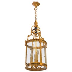 Lanterne de hall à quatre lumières en bronze patiné et doré de style Louis XVI, vers 1880