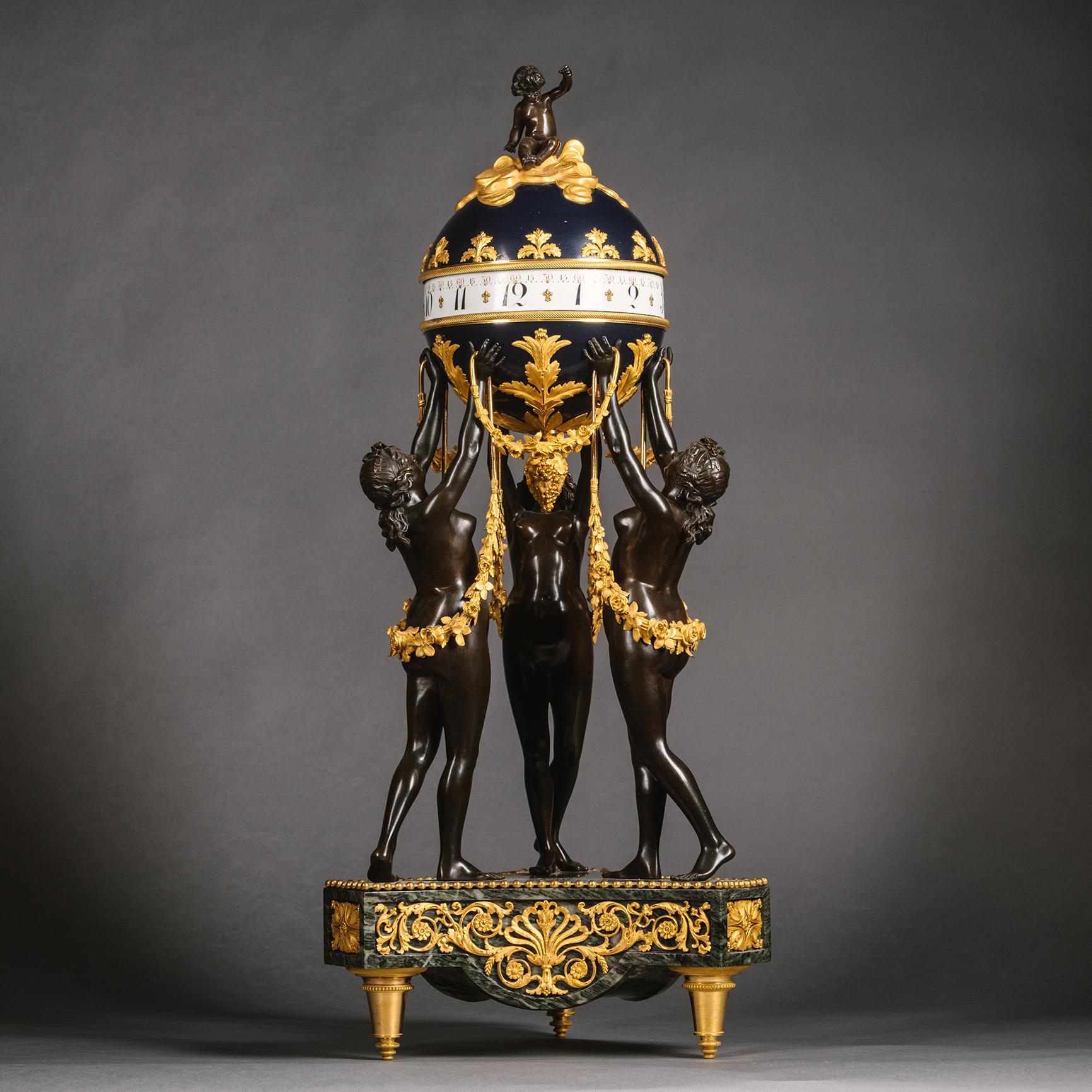 Drei Graces kugelförmige Uhr im Louis-XVI.-Stil von Beurdeley (Bronze) im Angebot
