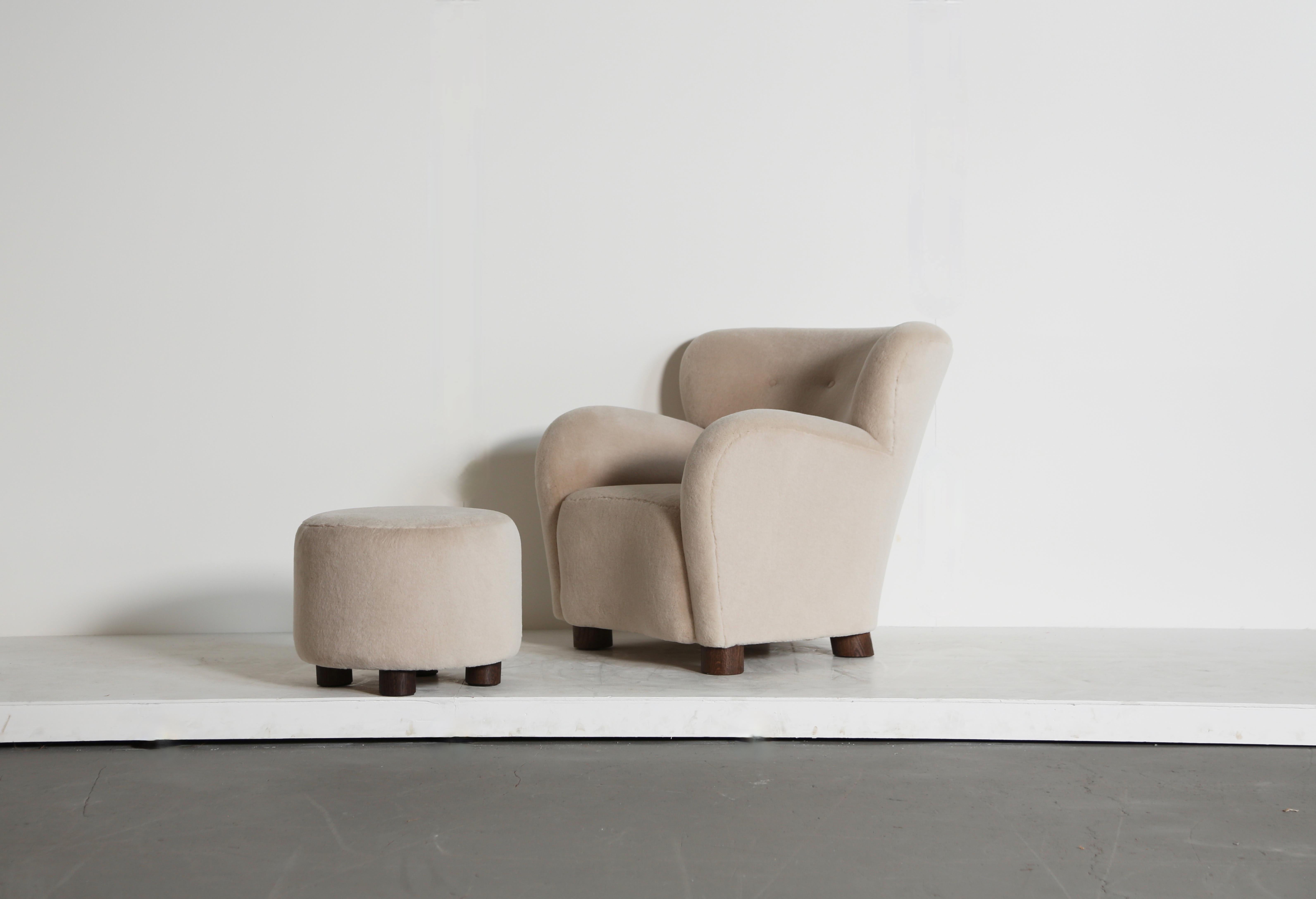 A superb modern lounge chair / armchair and ottoman.  Beech frame and sprung seat.  Upholstered in a premium, soft, pure alpaca wool fabric with solid oak feet.  Handmade in England.  Fast shipping worldwide.   The displayed price is for a single