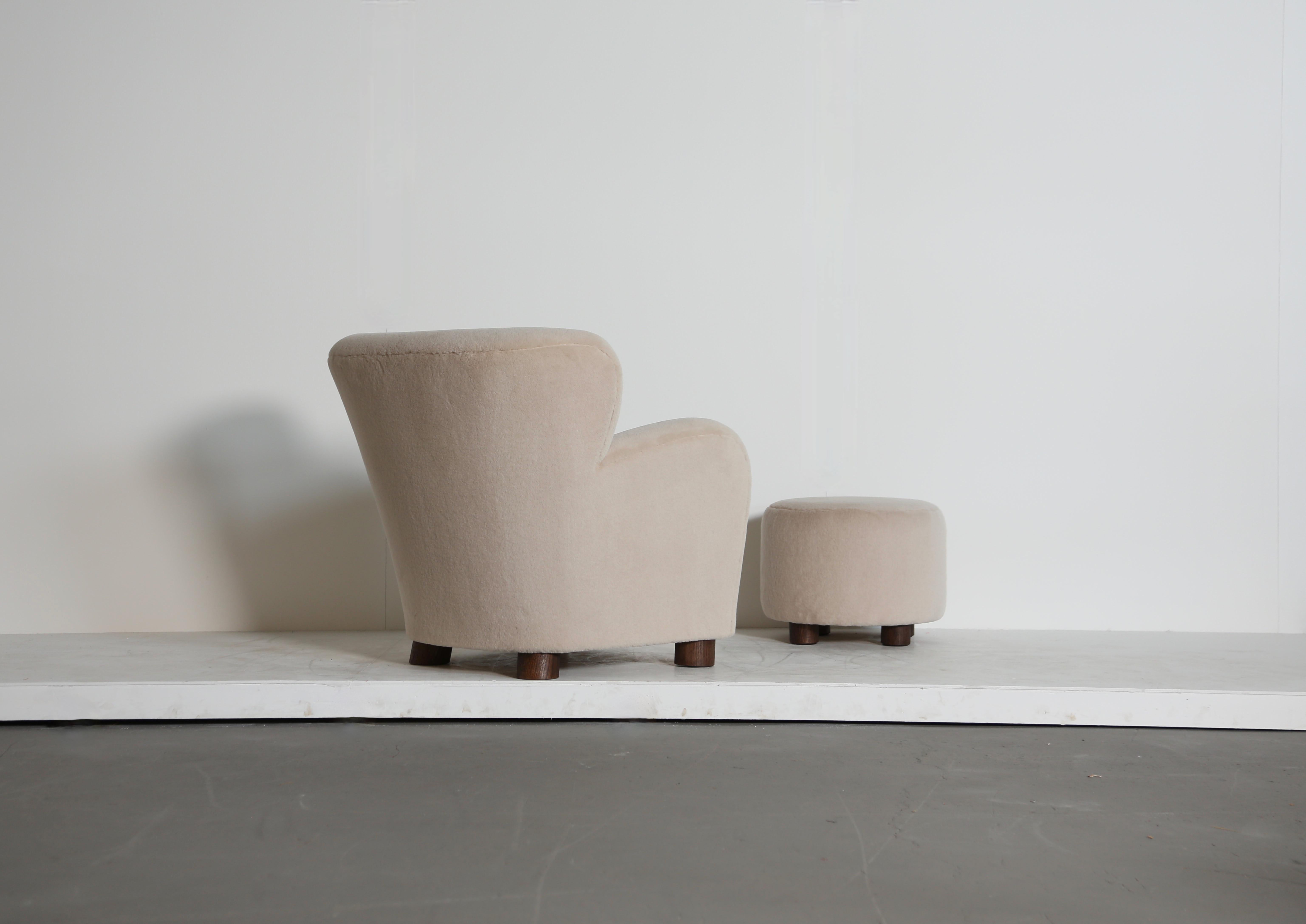 Scandinavian Modern A Lounge Chair / Armchair and Ottoman, Upholstered in Pure Ivory Alpaca For Sale