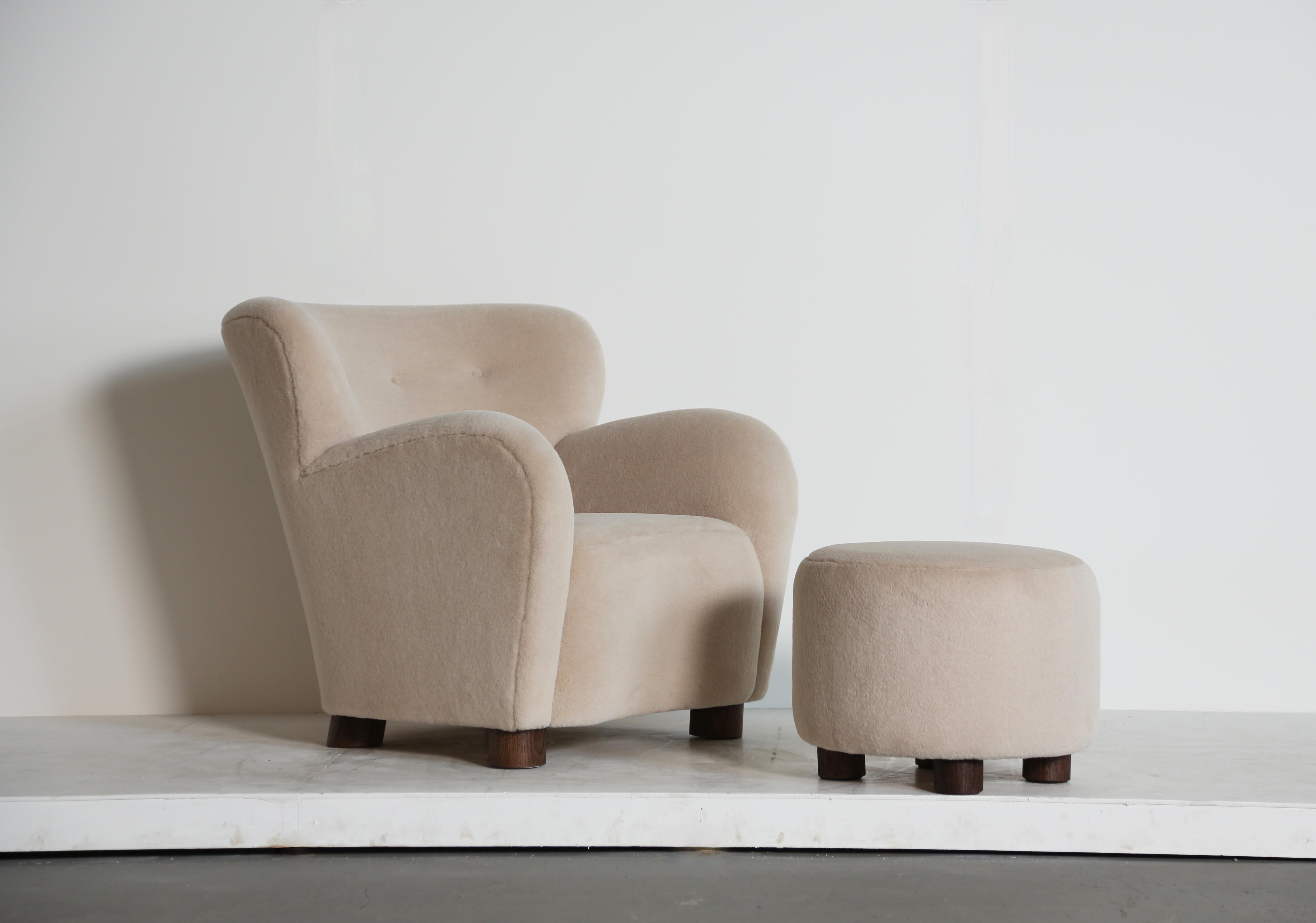 British A Lounge Chair / Armchair and Ottoman, Upholstered in Pure Ivory Alpaca For Sale