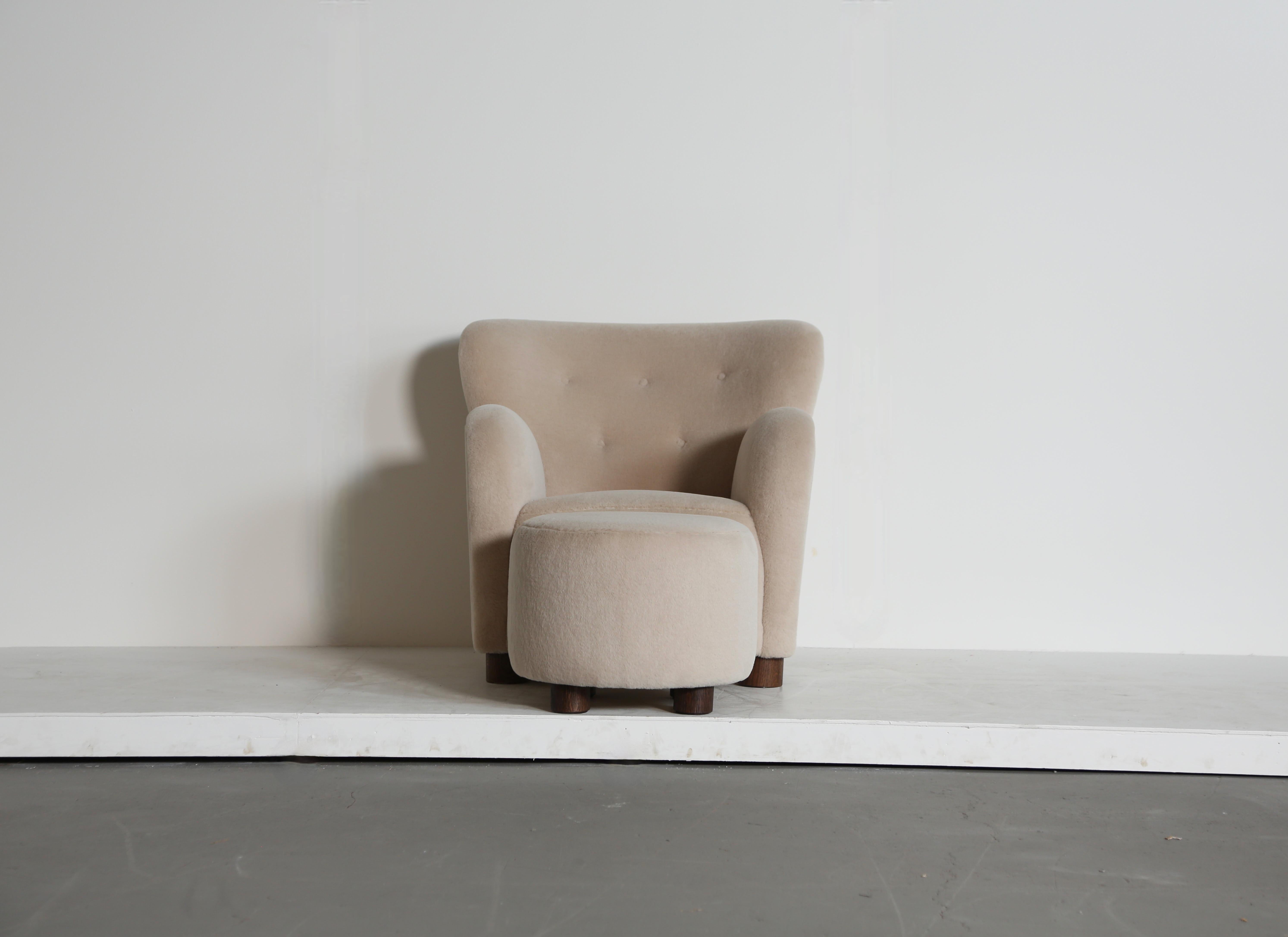 A Lounge Chair / Armchair and Ottoman, Upholstered in Pure Ivory Alpaca For Sale 1