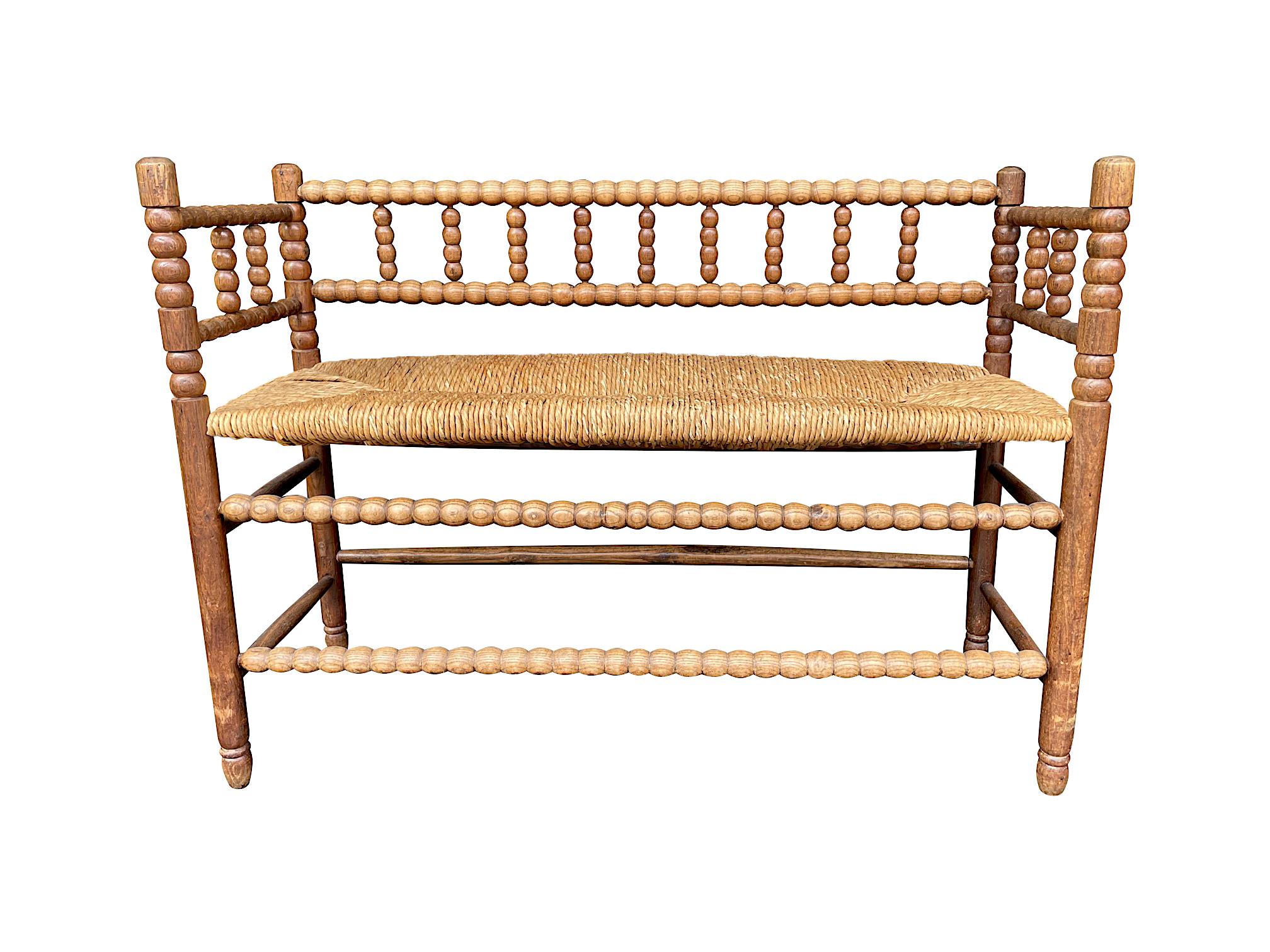 Lovely 1890s English Oak and Elm Bobbin Bench Seat with Rush Woven Seat 3