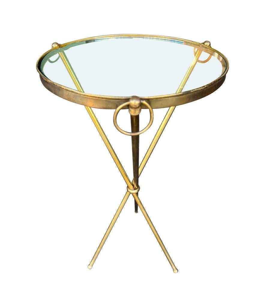 A lovely 1950s Fontana Arte style solid brass tripod martini table 6