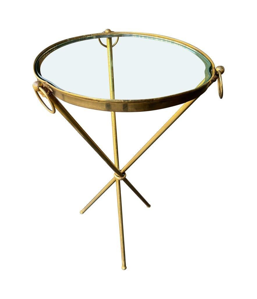 A lovely 1950s Fontana Arte style solid brass tripod martini table 9
