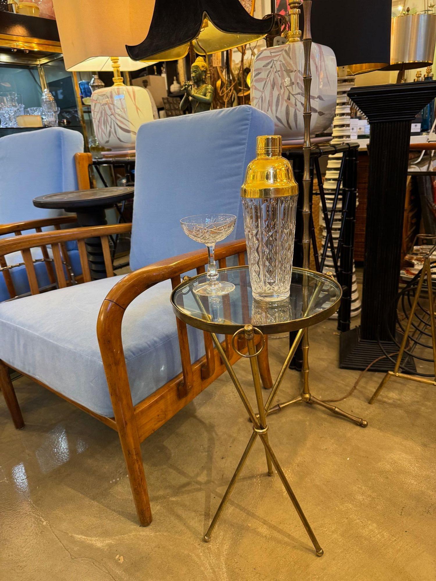 A lovely 1950s Fontana Arte style solid brass tripod martini table with thick 15mm glass top and hooped detail rings.