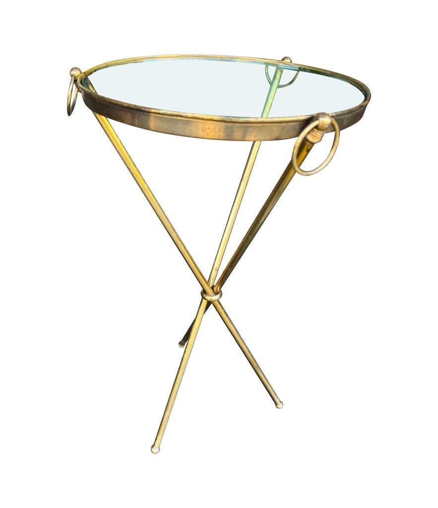 Brass A lovely 1950s Fontana Arte style solid brass tripod martini table