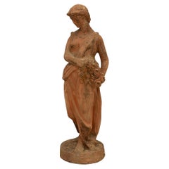 A lovely and most unique Continental mid 19th century Terra Cotta statue