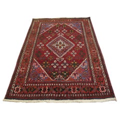 Ravissant tapis de laine rouge vif, motif arbre de vie