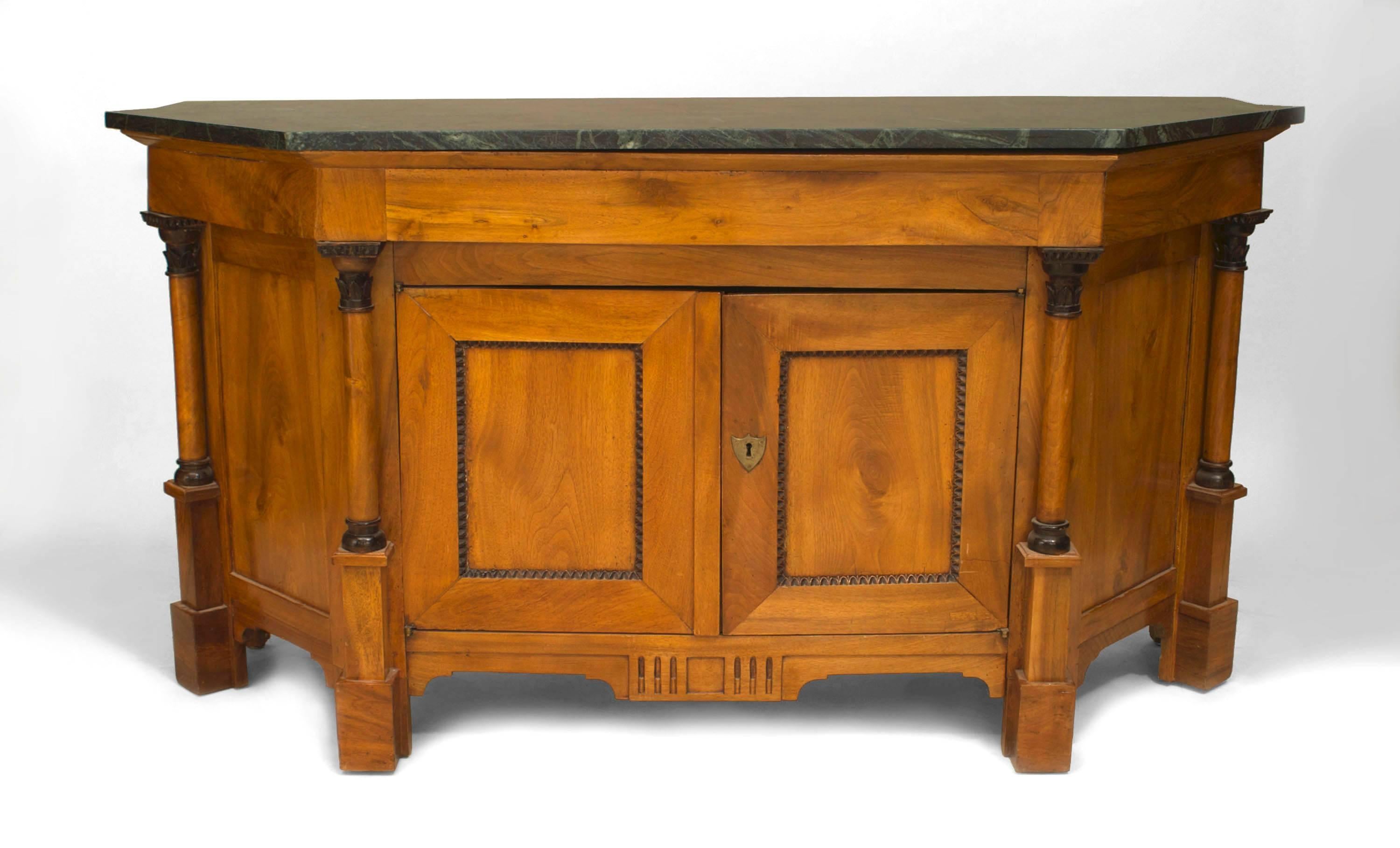 Italian Empire Neo-classic (19th Century) fruitwood sideboard cabinet with a marble top over two doors flanked by columns with canted sides.
