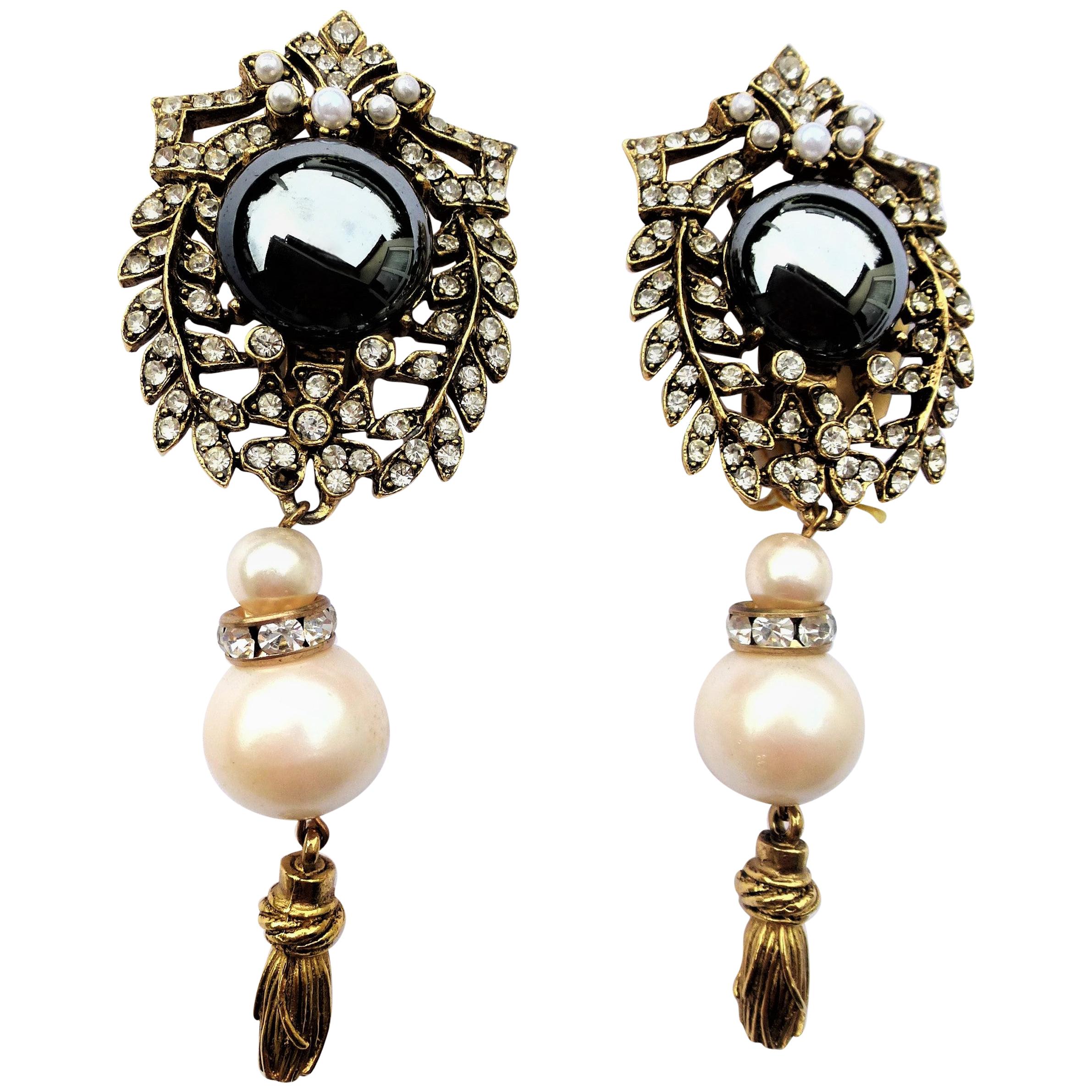 A lovely long pair ear clips with rhinestones, pearl and tassel