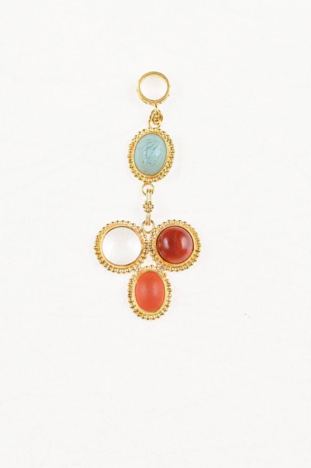 A lovely multicolored drop pendant for necklace made from Roman glass (400 AD-500 AD) set within a custom 21-karat gold pendant with gold bead accents and 21-karat gold bail. Pendant measures 1 7/8